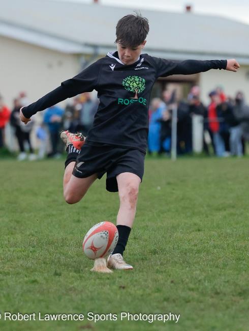 Charlie Holder place-kicking in rugby